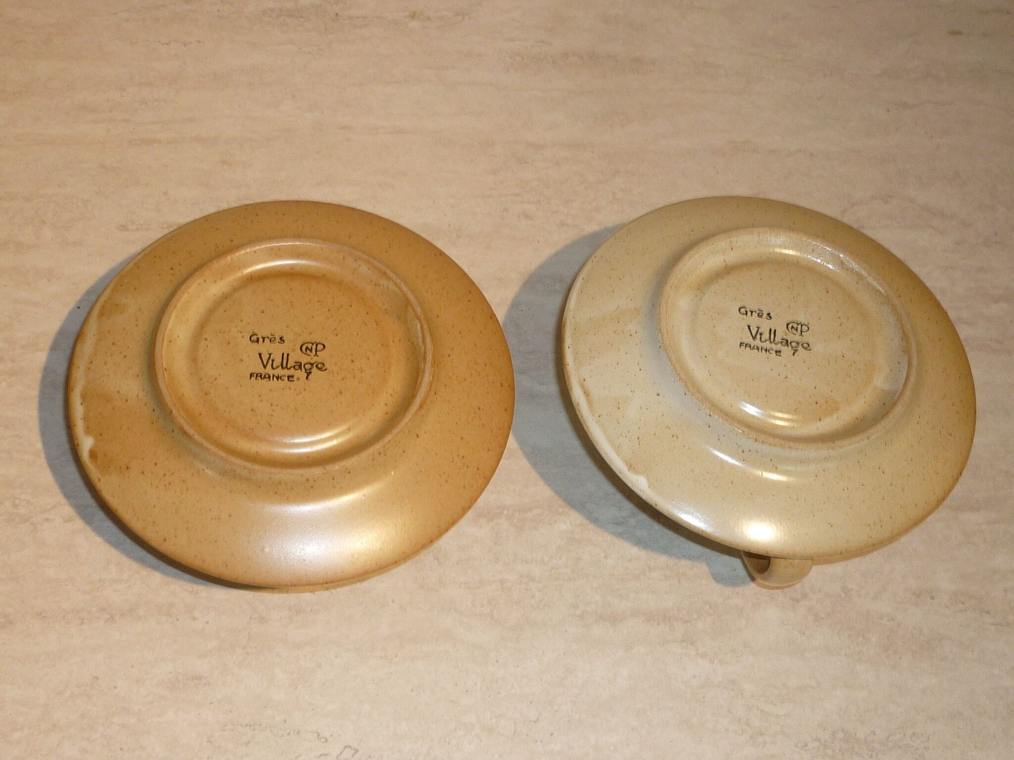 CNP Village stoneware cups and sub-cups