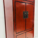 Red Chinese cabinet with three doors