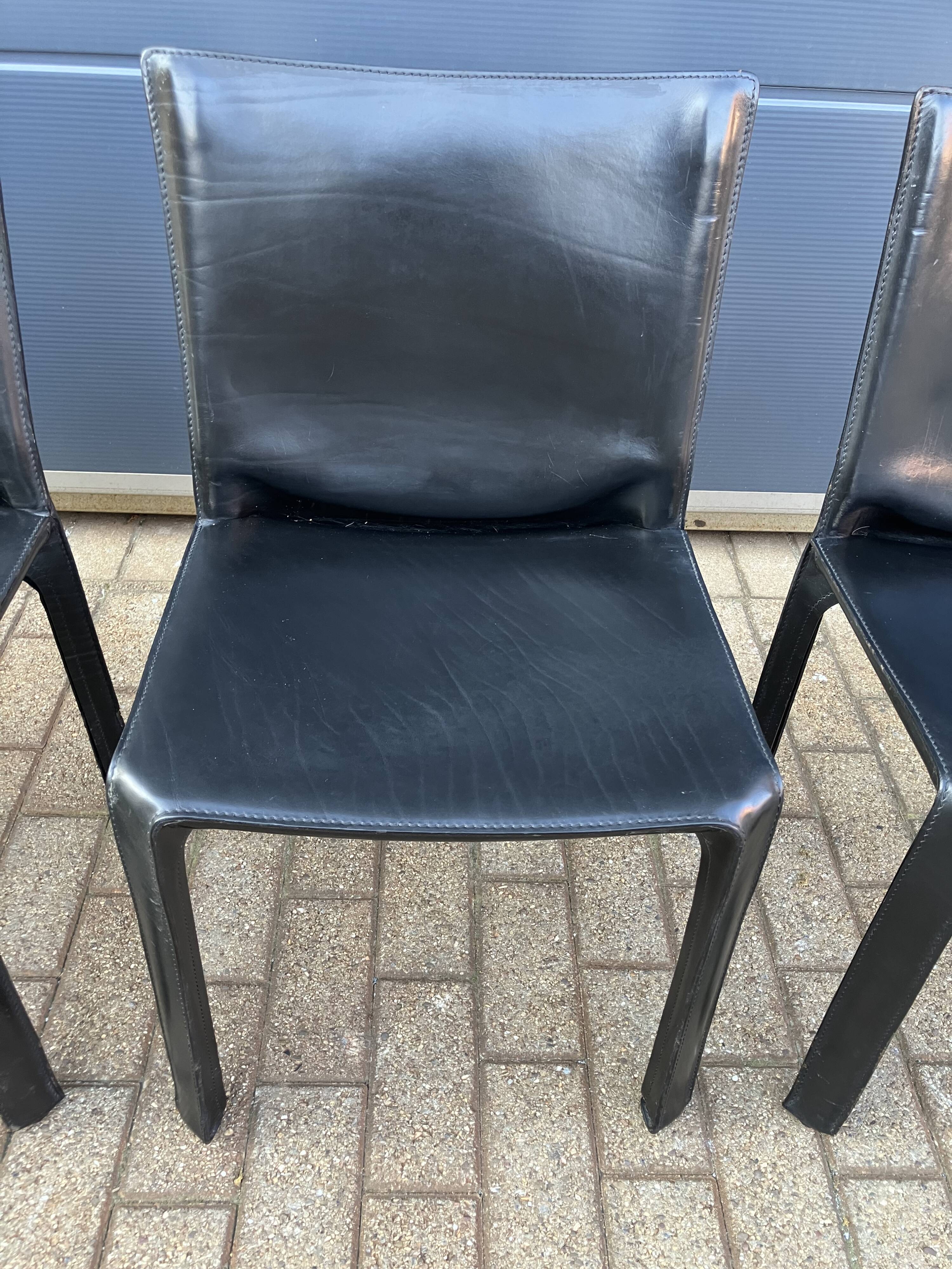 4 black Cassina Cab chairs by Mario Bellini