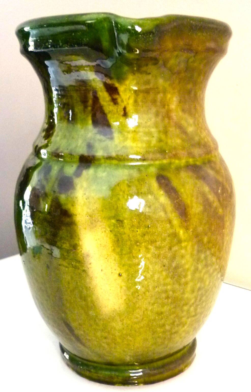 Pitcher vase, thick green glazed terracotta, signature to be identified
