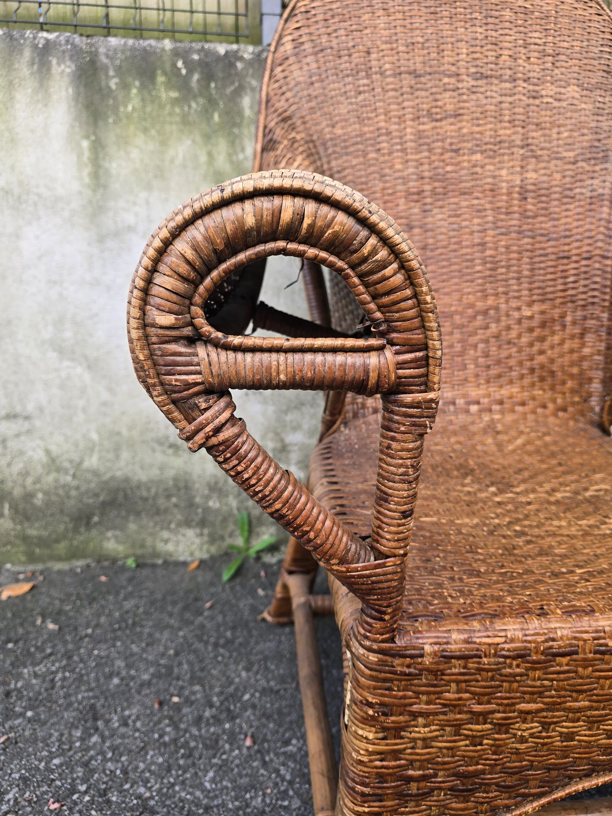 Arts & Crafts armchair in wicker and rattan attributed to Dryad & Co, UK, circa 1920.