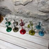 Antique and rare! Sold in a set of 12 colorful twisted stemmed glasses engraved with flowers and leaves