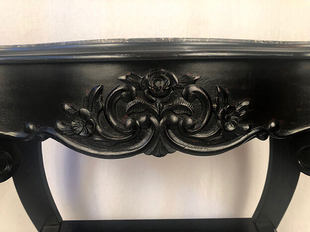 Pair of blackened wooden consoles, marble top