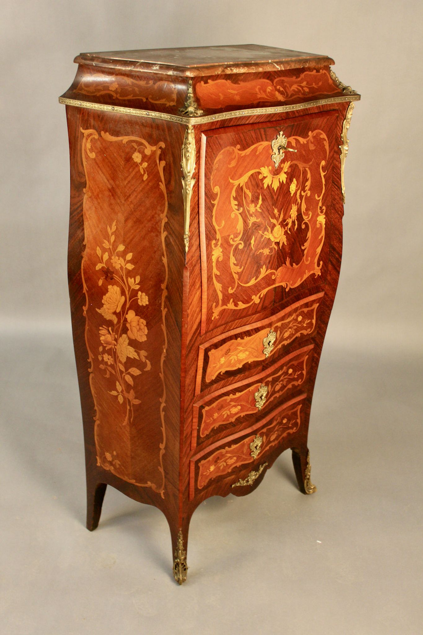 Secrétaire de dame marqueté galbé de style Louis XV