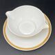 Limoges porcelain gravy boat with gold edging