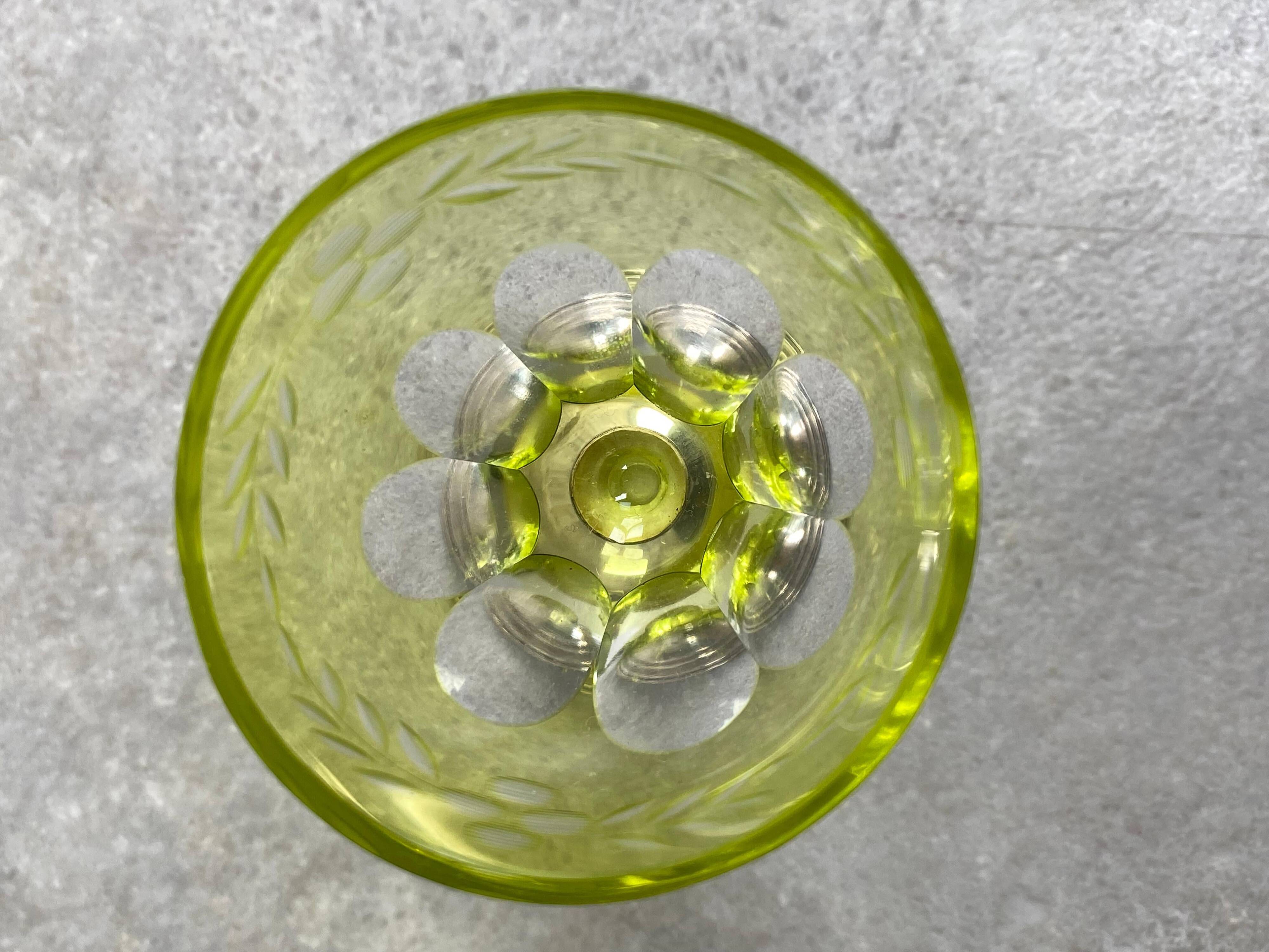 Set of 6 coloured stemmed glasses on silver stems.