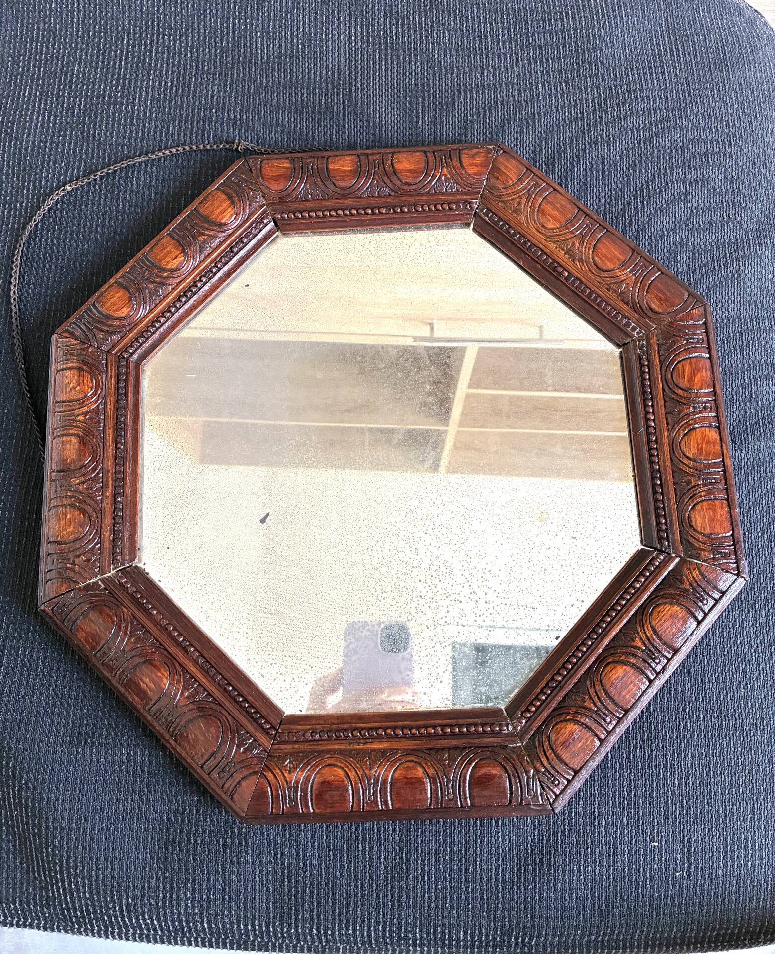 Octagonal mirror, glossy varnished oak, Art Deco.