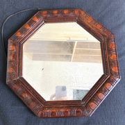 Octagonal mirror, glossy varnished oak, Art Deco.