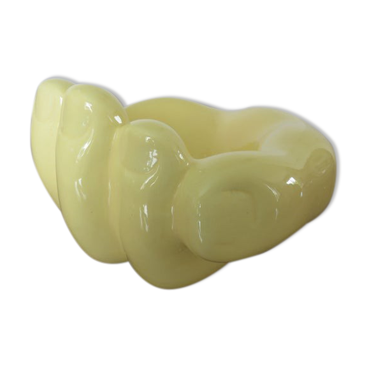 Empty hand-shaped pocket in pale yellow ceramic years70