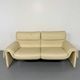 Two-seater designer sofa De Sede DS-2011 in cream leather with adjustable backrest.