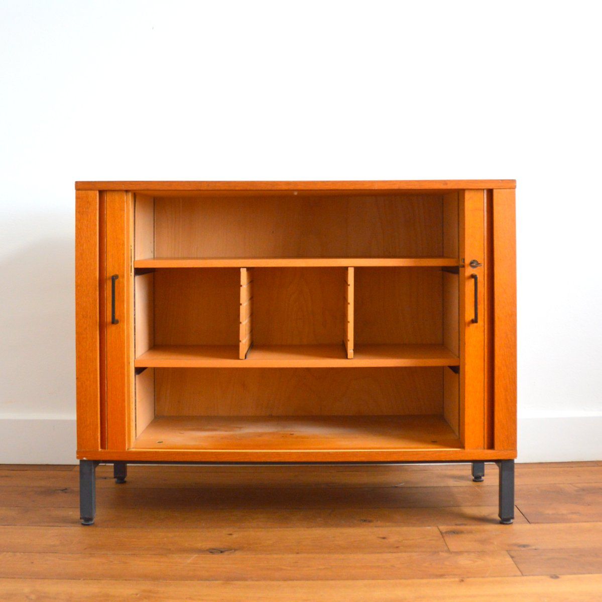 Storage cabinet with sliding curtain shutter 1950s