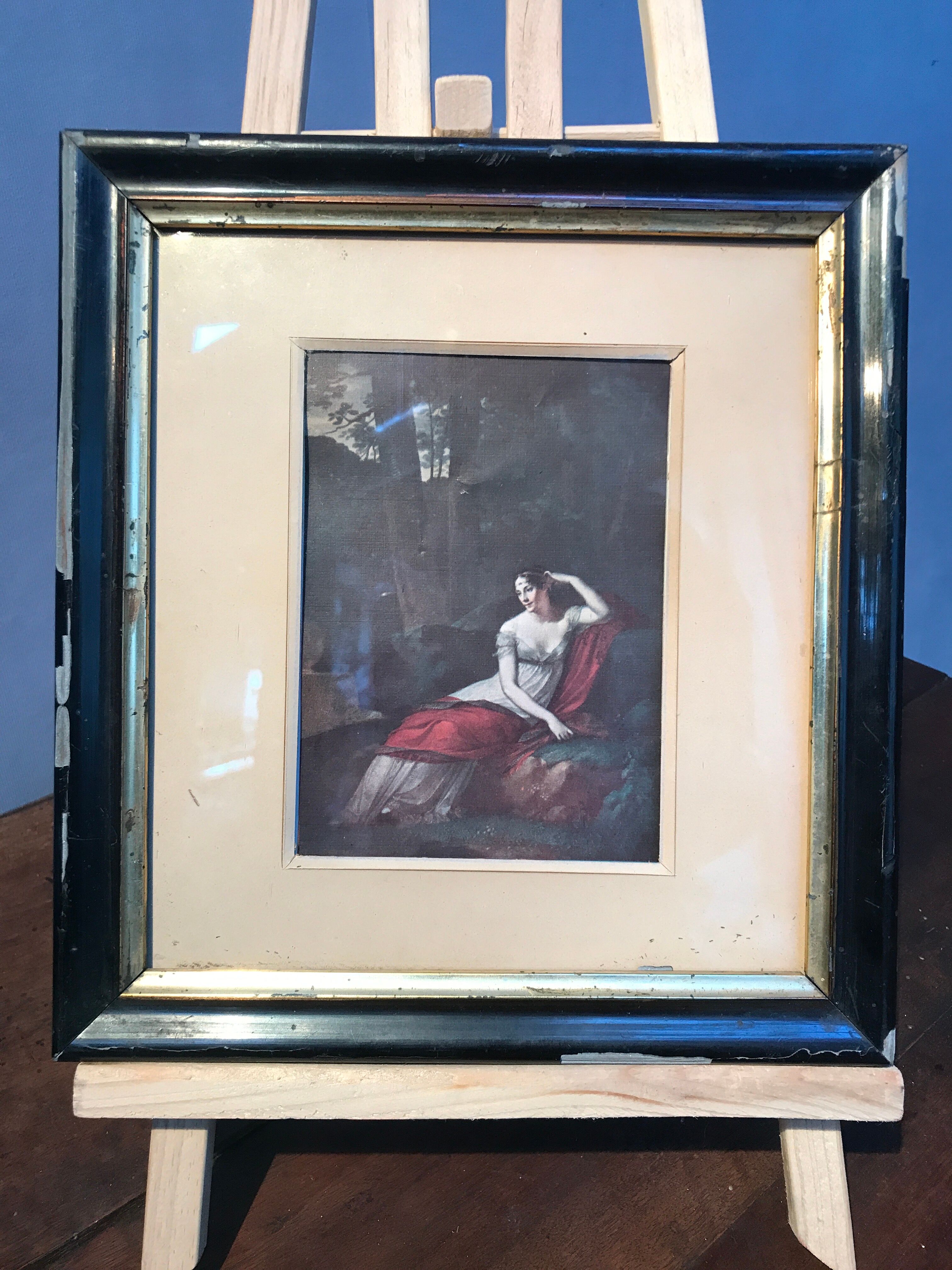 Lithograph of a woman lying in the forest