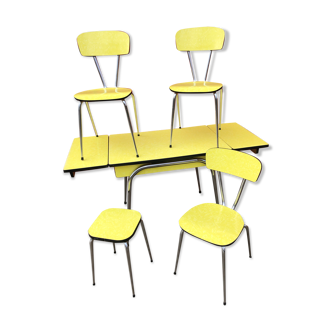 Table in yellow formica with stool and chairs
