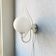 Metal applique with 80s glass sphere