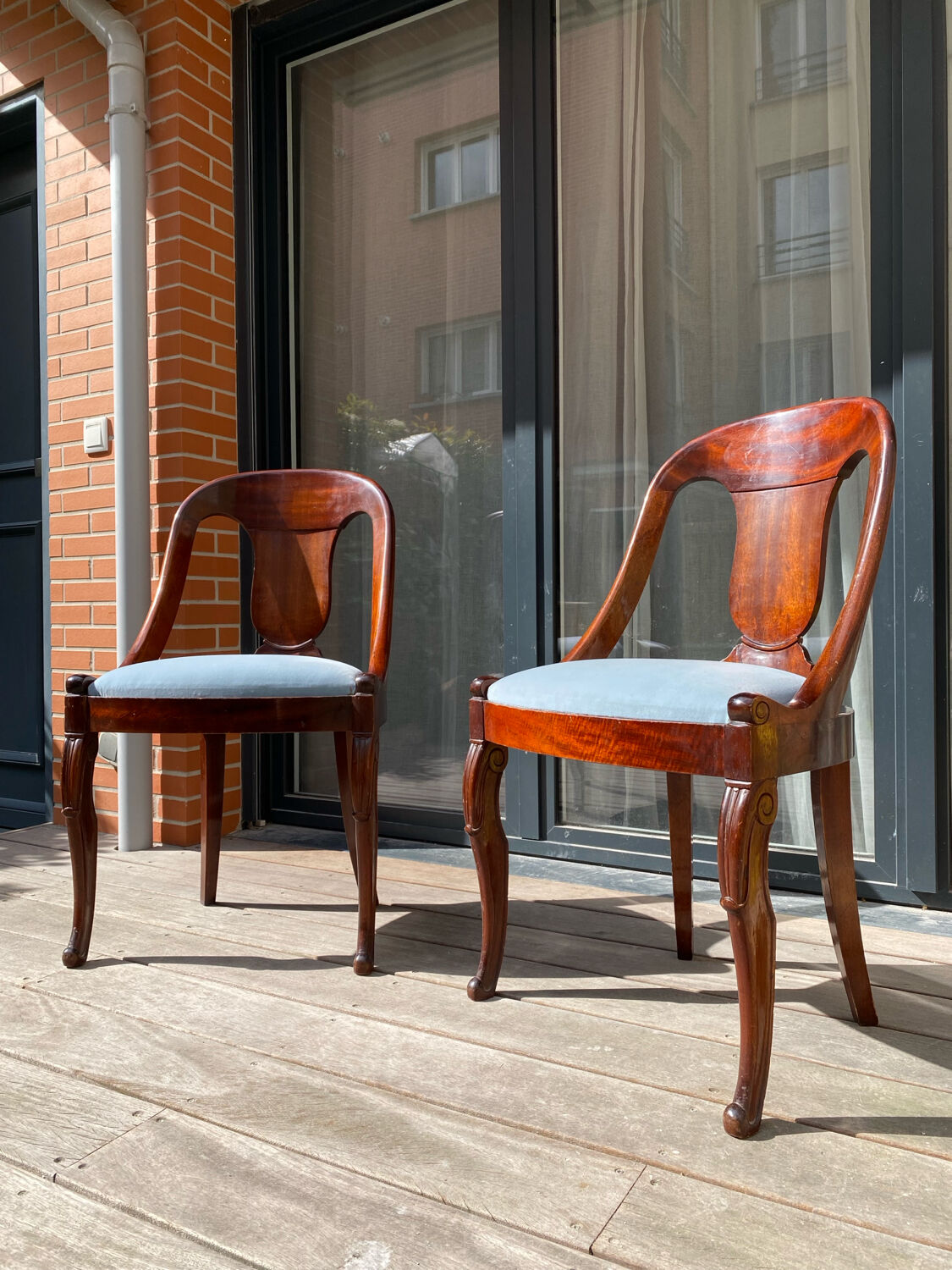 Pair of mahogany gondola chairs