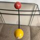 Iron wall coat rack and wooden hooks from the 60s