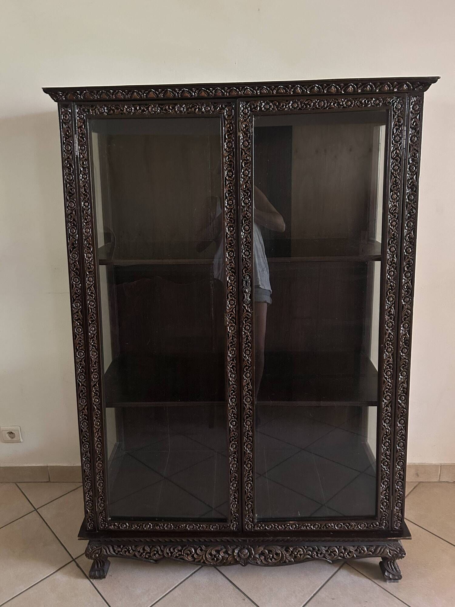 Thai trapezoidal display cabinet in carved solid wood