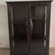 Thai trapezoidal display cabinet in carved solid wood