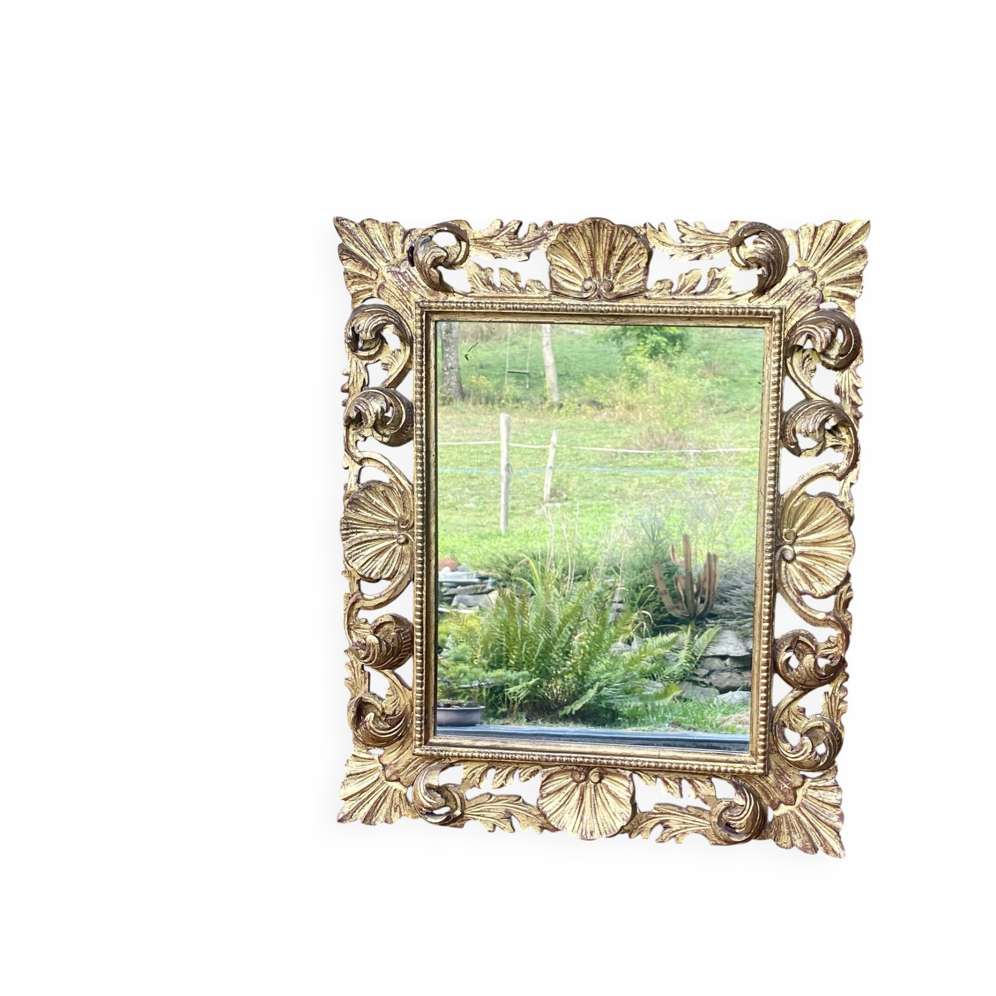 Antique mirror in carved wood