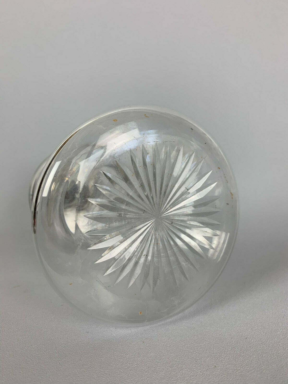 Blown glass carafe with silver frame and cap