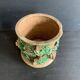 Large 19th century slip pot with vine decoration