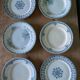 Set of 6 old flat plates in mismatched iron earth