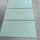 Folding and extending kitchen table in steel and aqua green wood