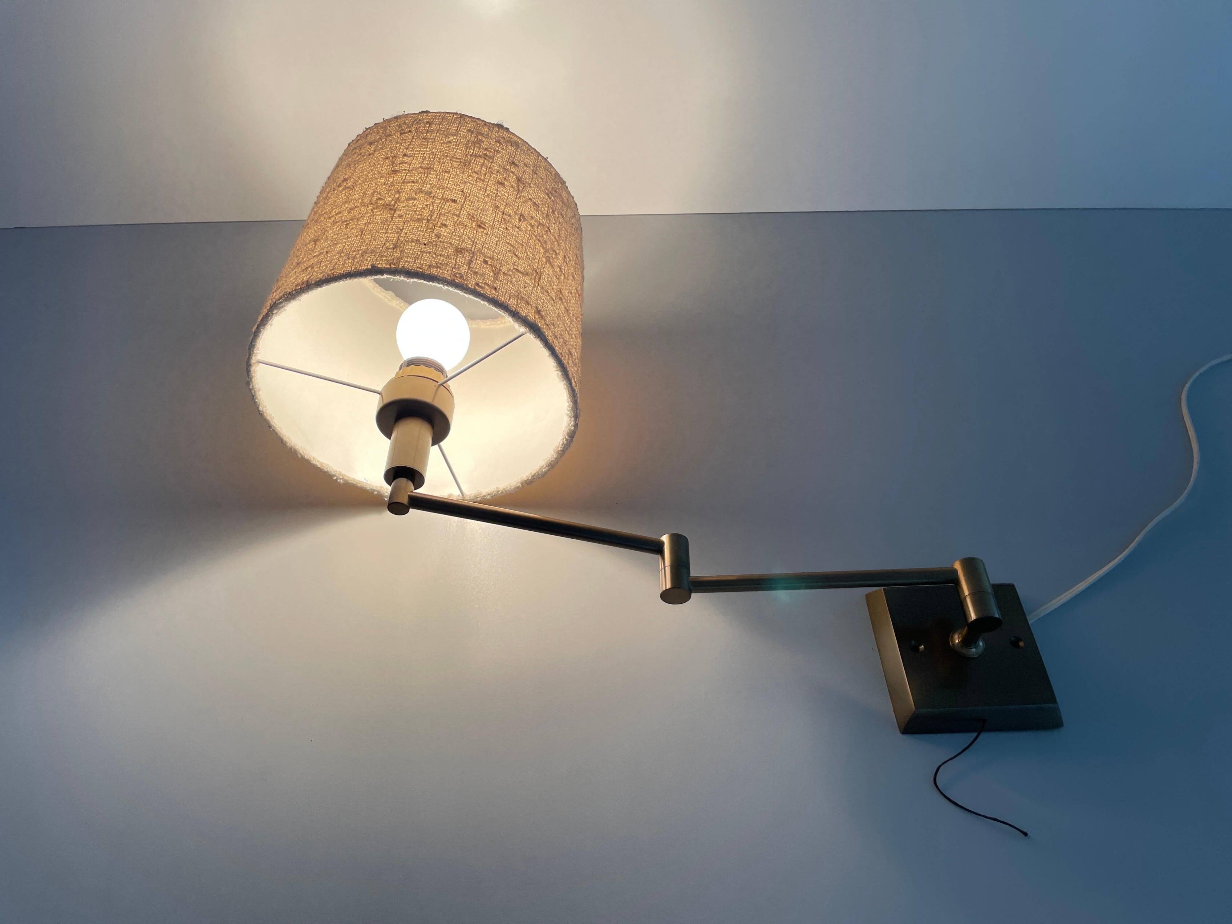 Adjustable brass wall lamp with fabric shade, Danish design, 1970s, Denmark.