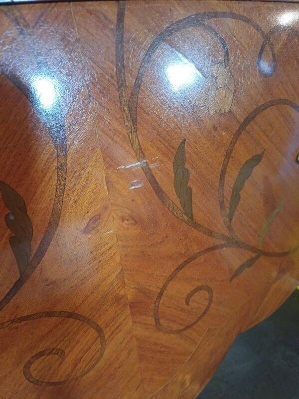 Louis XV style commode with marquetry and marble.
