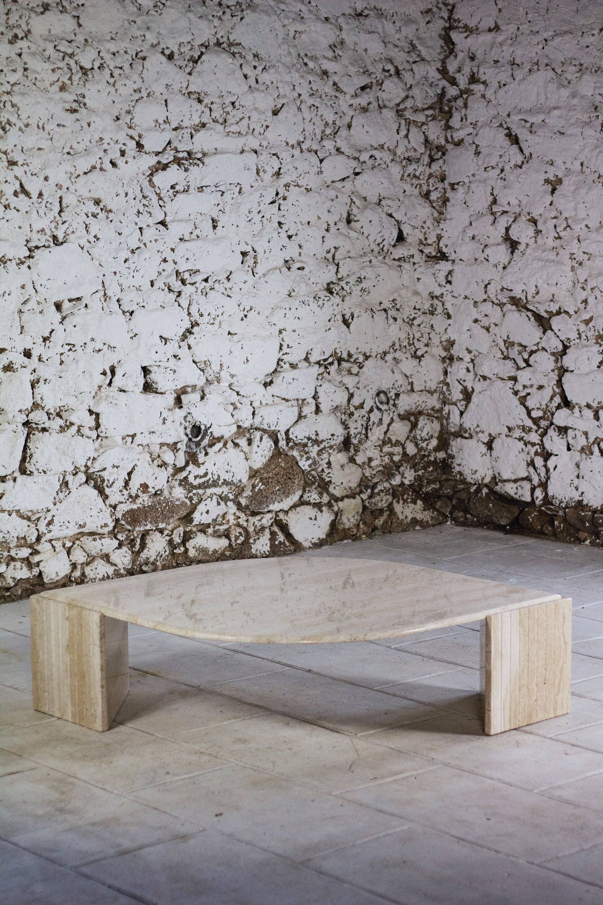 Travertine coffee table "Eye" or "drop" by Roche Bobois, 1980