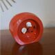 Vintage mechanical alarm clock in orange plastic Uti West Germany