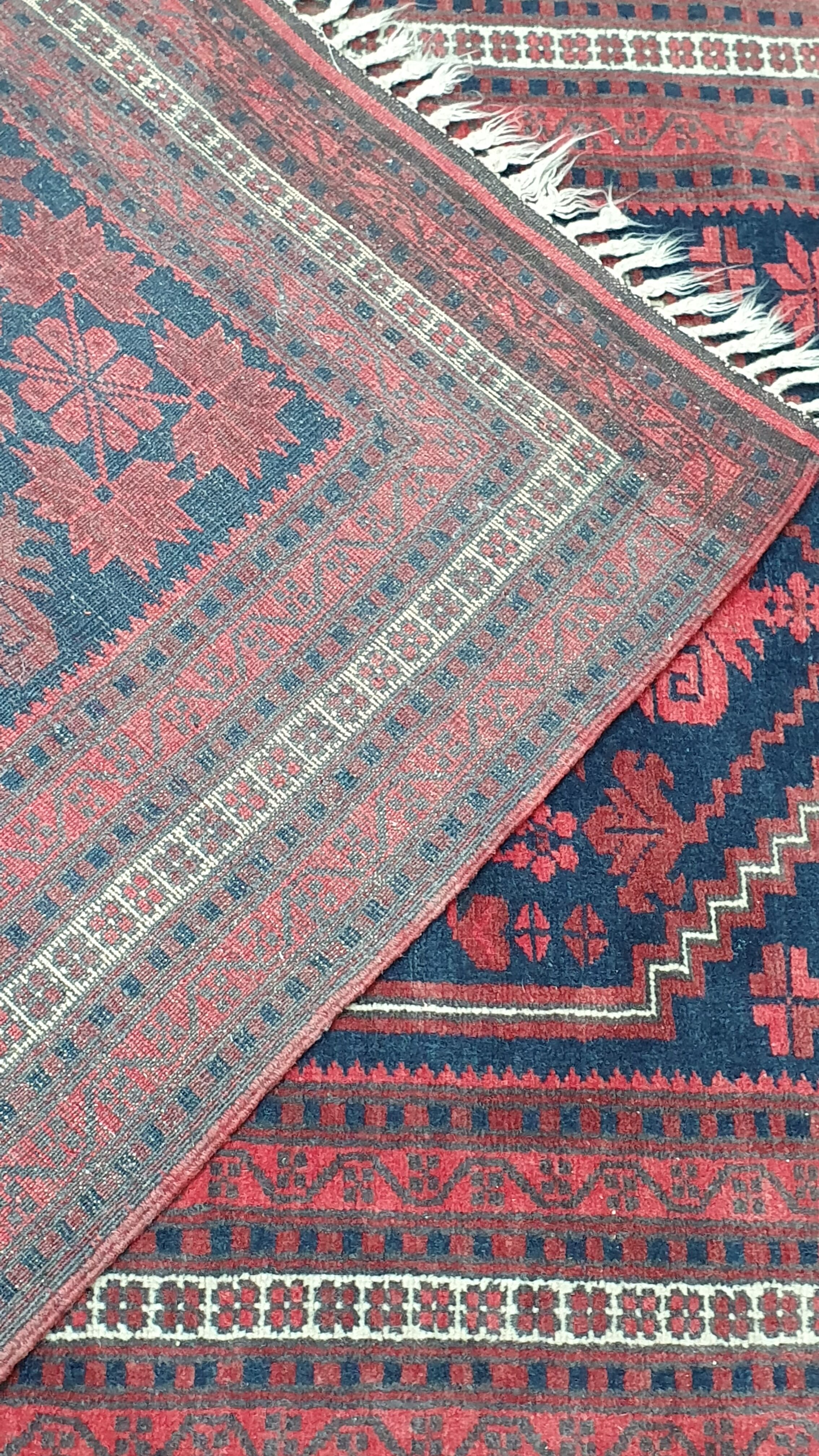 Old hand-knotted wool carpet