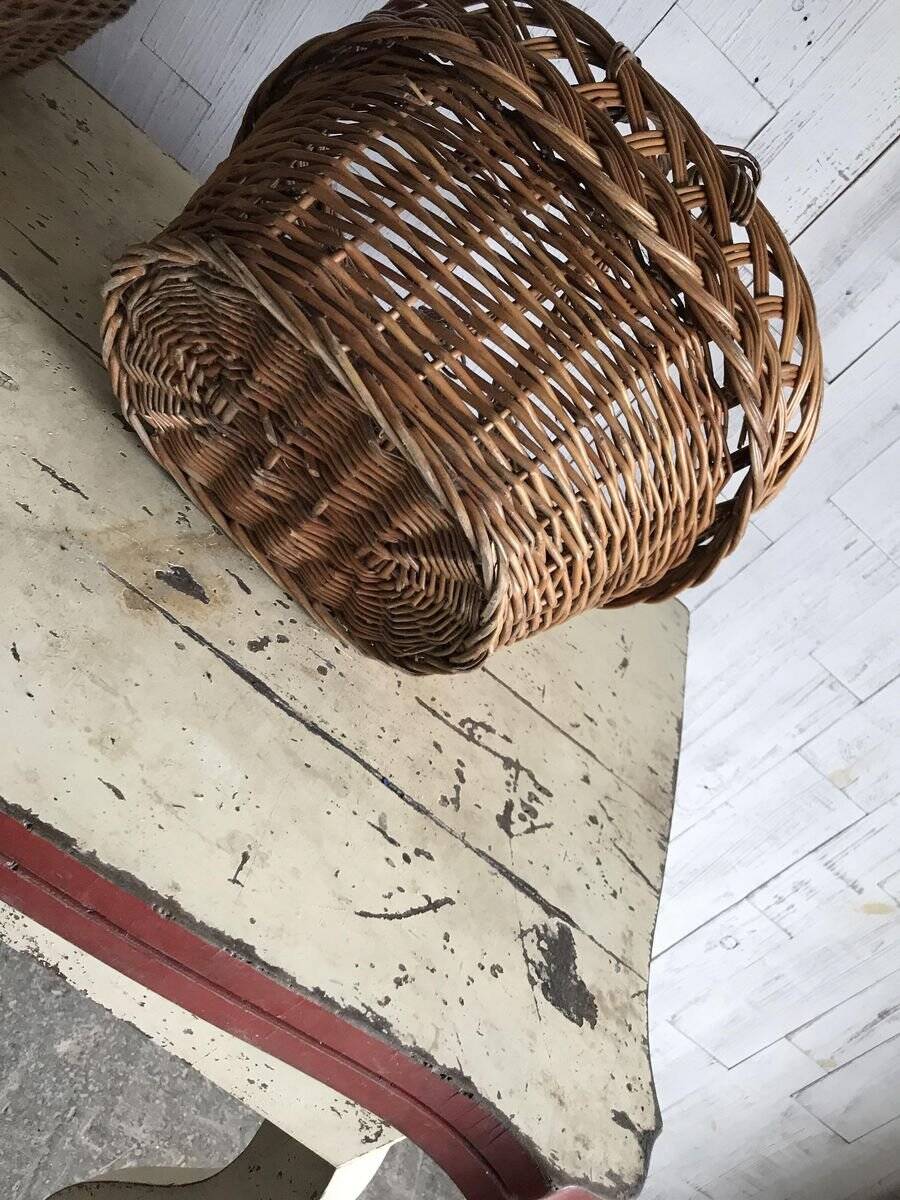 Set of 2 brown wicker baskets from the 1960s — decorative weaving and double handles.