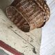 Set of 2 brown wicker baskets from the 1960s — decorative weaving and double handles.