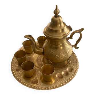 Old Moroccan tea service in yellow copper