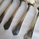 12 small silver-plated metal spoons by Guildart