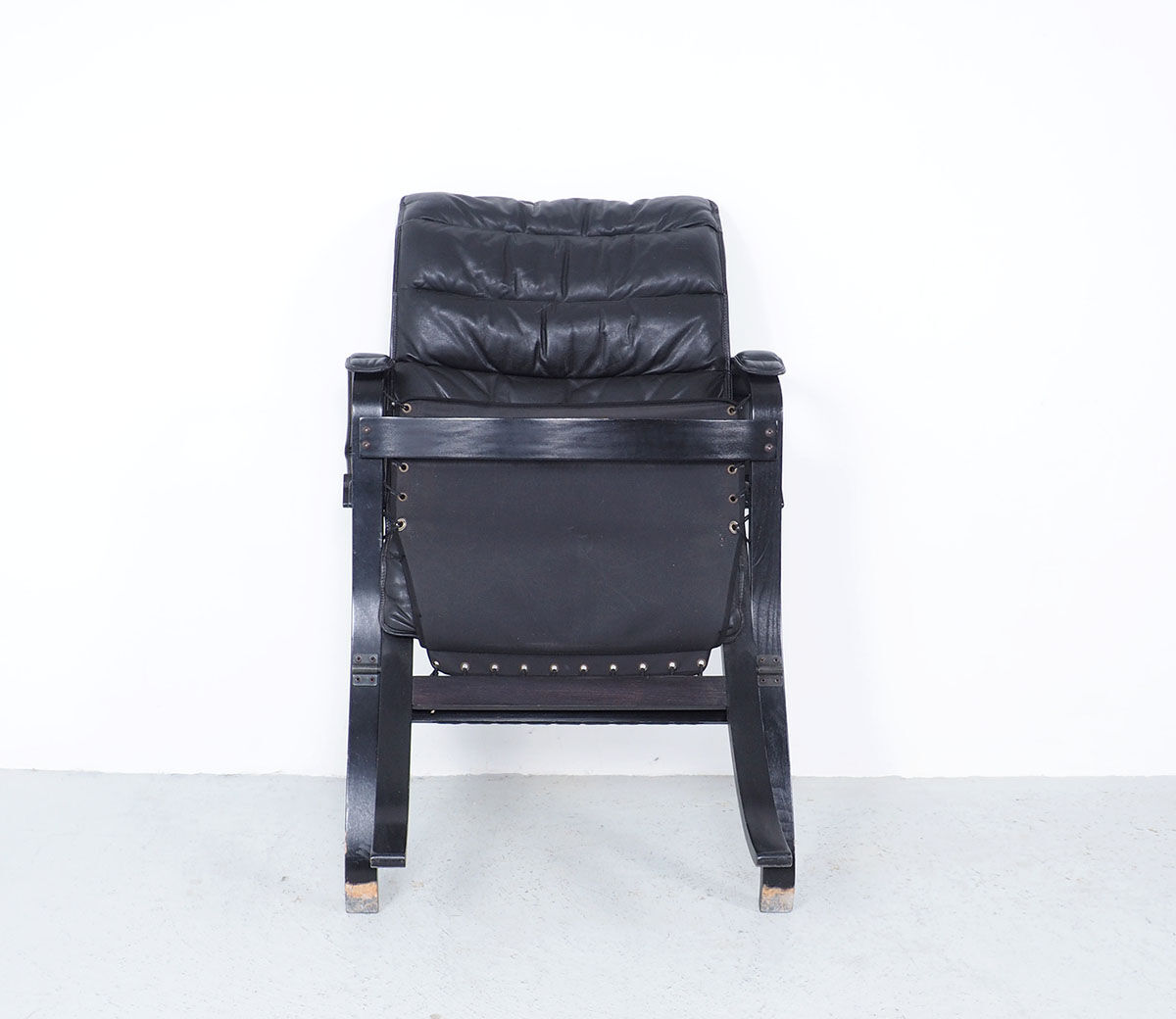 Westnofa black leather Flex armchair with ottoman