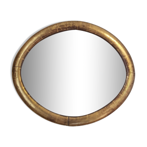 Miroir ovale à la feuille d'or