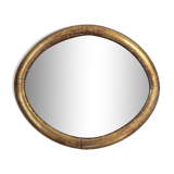 Oval mirror with gold leaf
