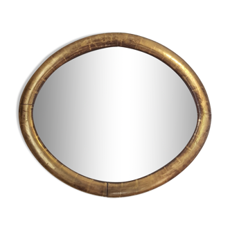 Miroir ovale à la feuille d'or