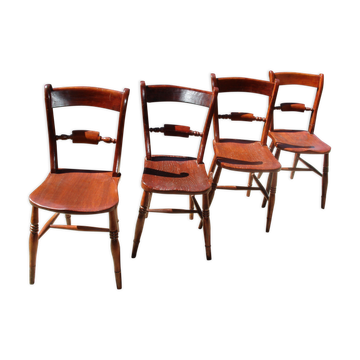 Série de 4 chaises au modèle d'amirauté anglaise du XIX siècle en orme massif
