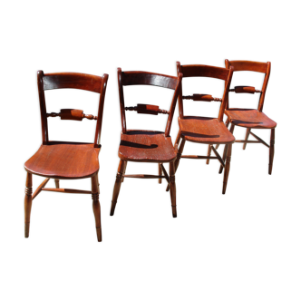 Série de 4 chaises au modèle d'amirauté anglaise du XIX siècle en orme massif