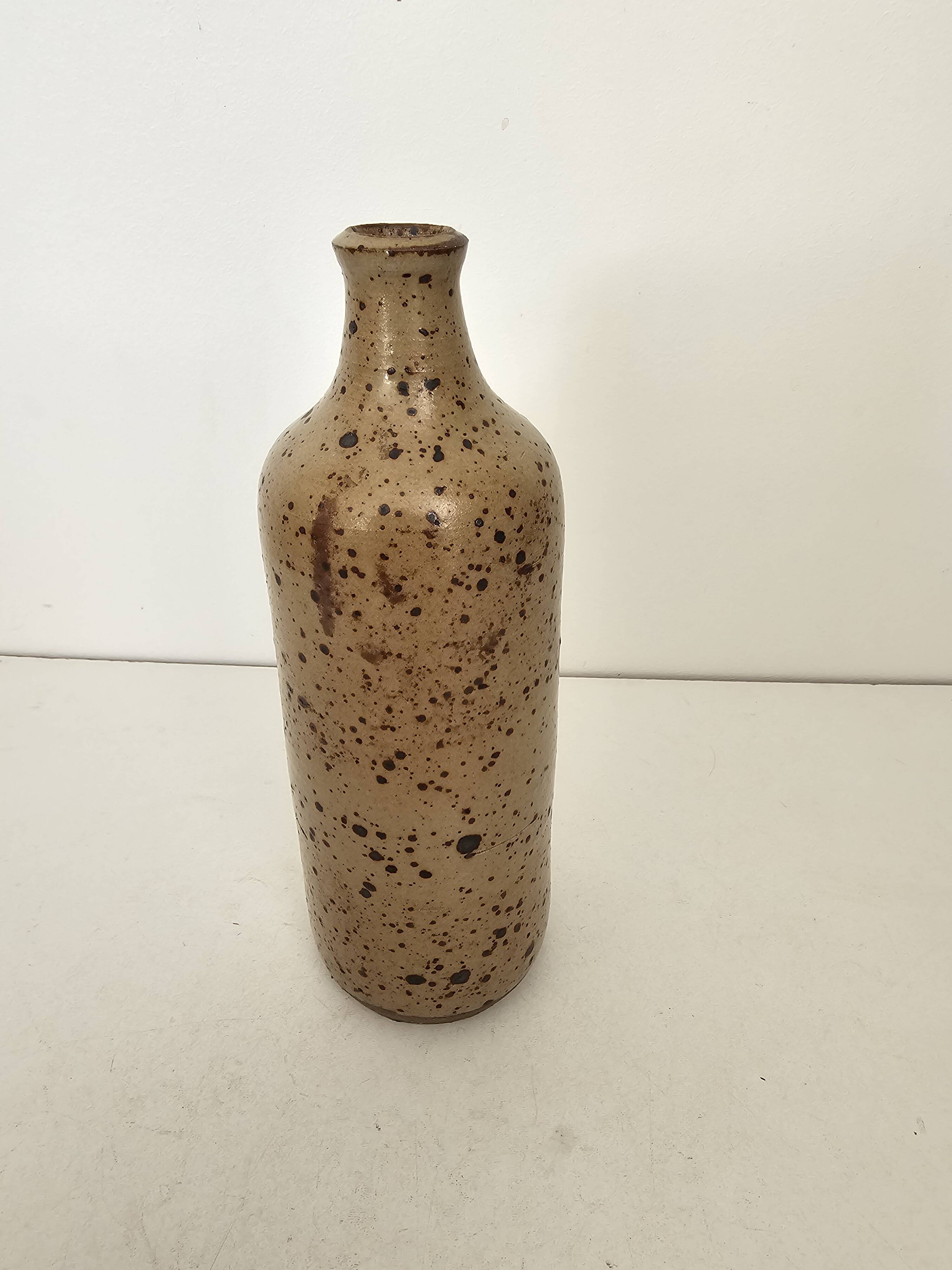 Pyrite stoneware single-flower vase in the shape of a bottle signed Aular?