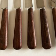 Set de 9 couteaux à manche de bois de palissandre mid century