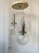 Vintage design pendant light with three transparent glass globes
