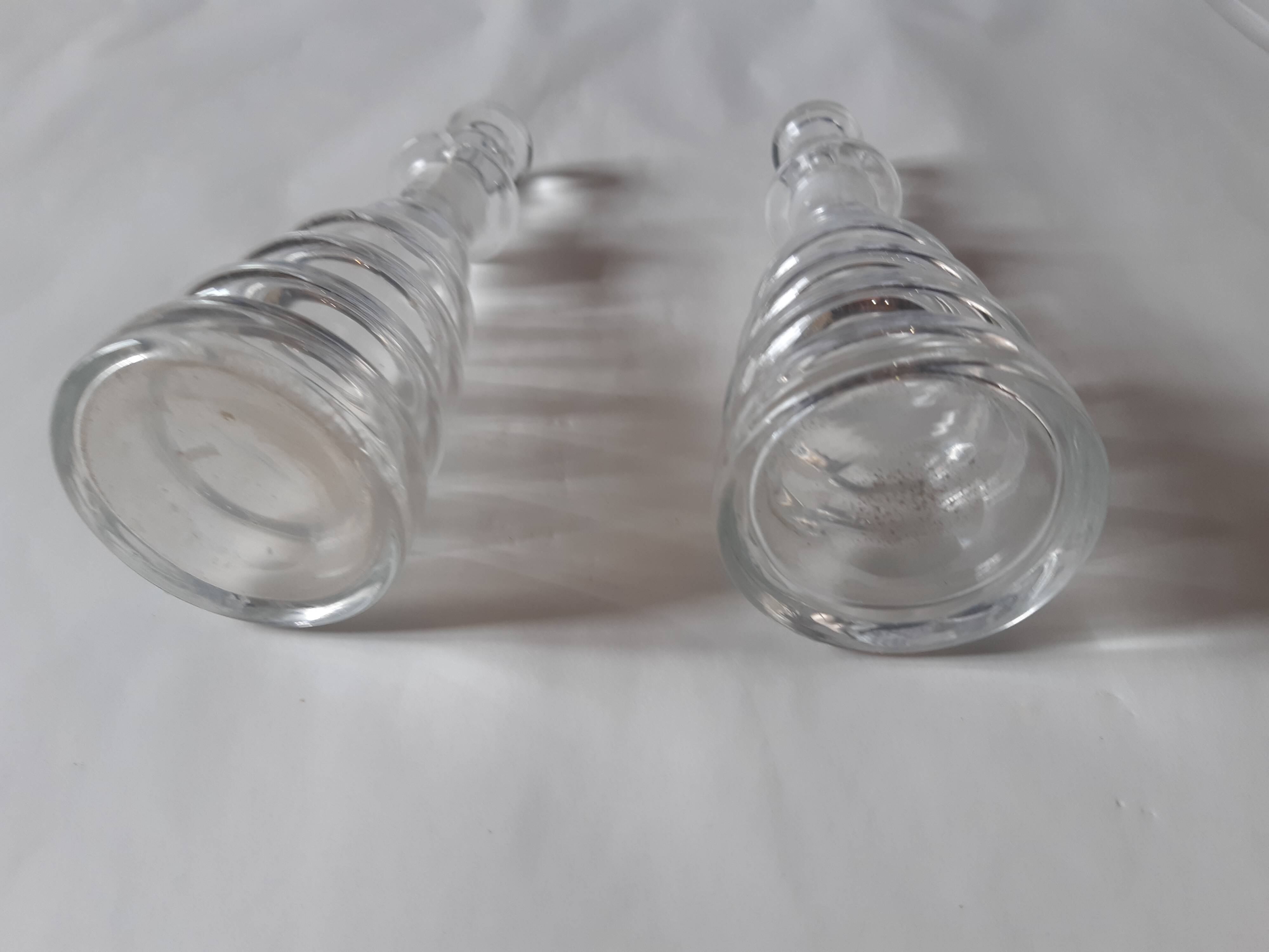 Set of two oil and vinegar glass cruets.