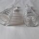 Set of two oil and vinegar glass cruets.