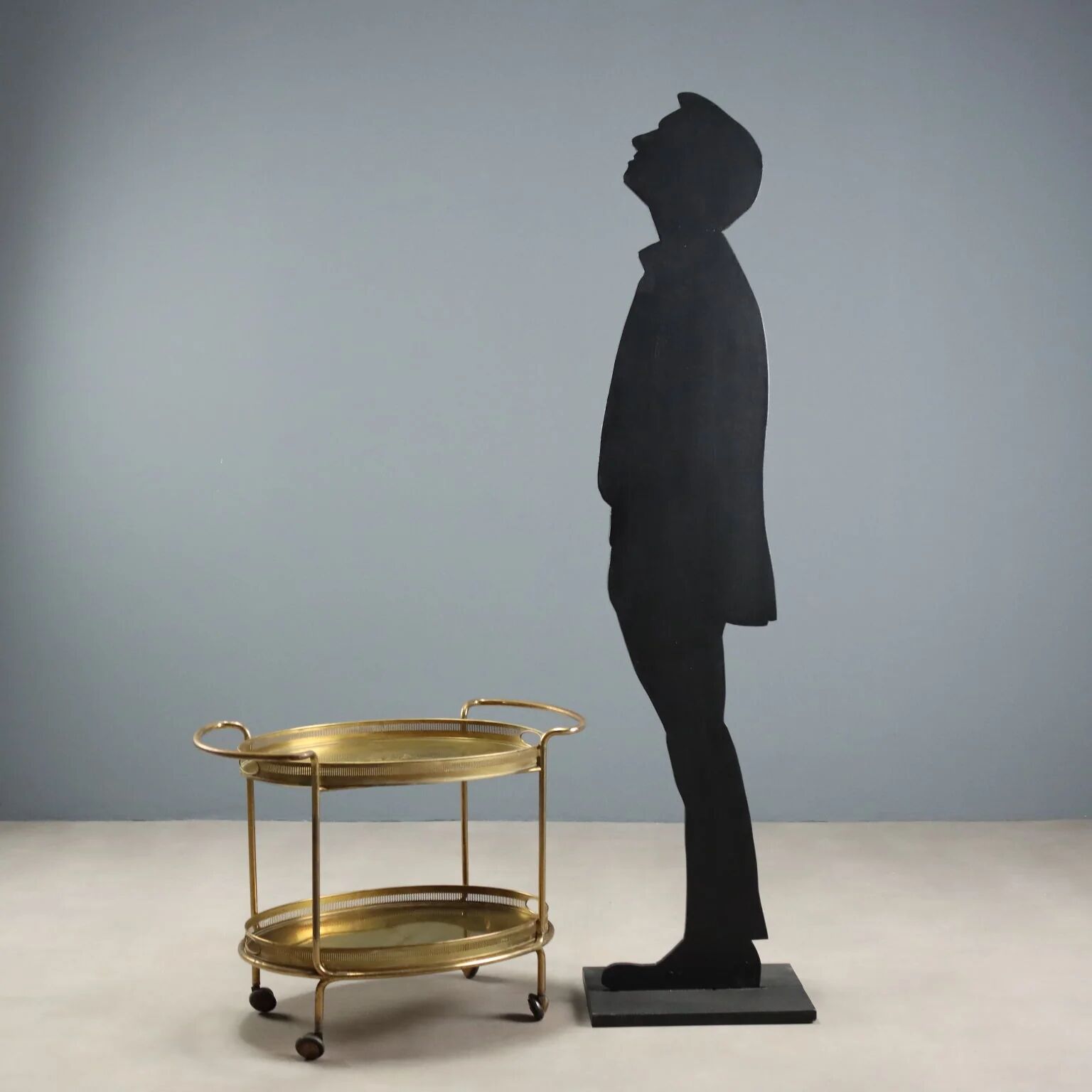 Vintage double-tier brass serving trolley, 1950s design.