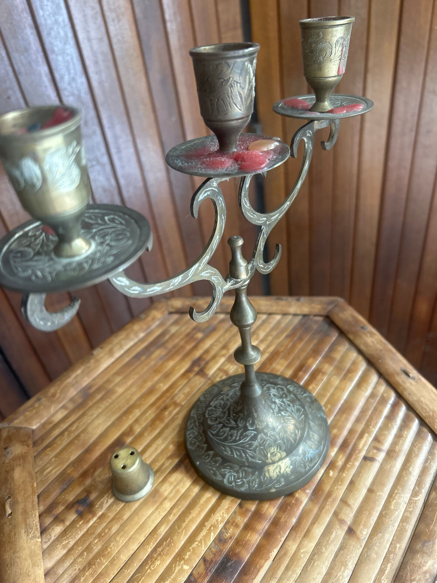 Vintage brass candelabrum engraved with three lights and a snuffer.
