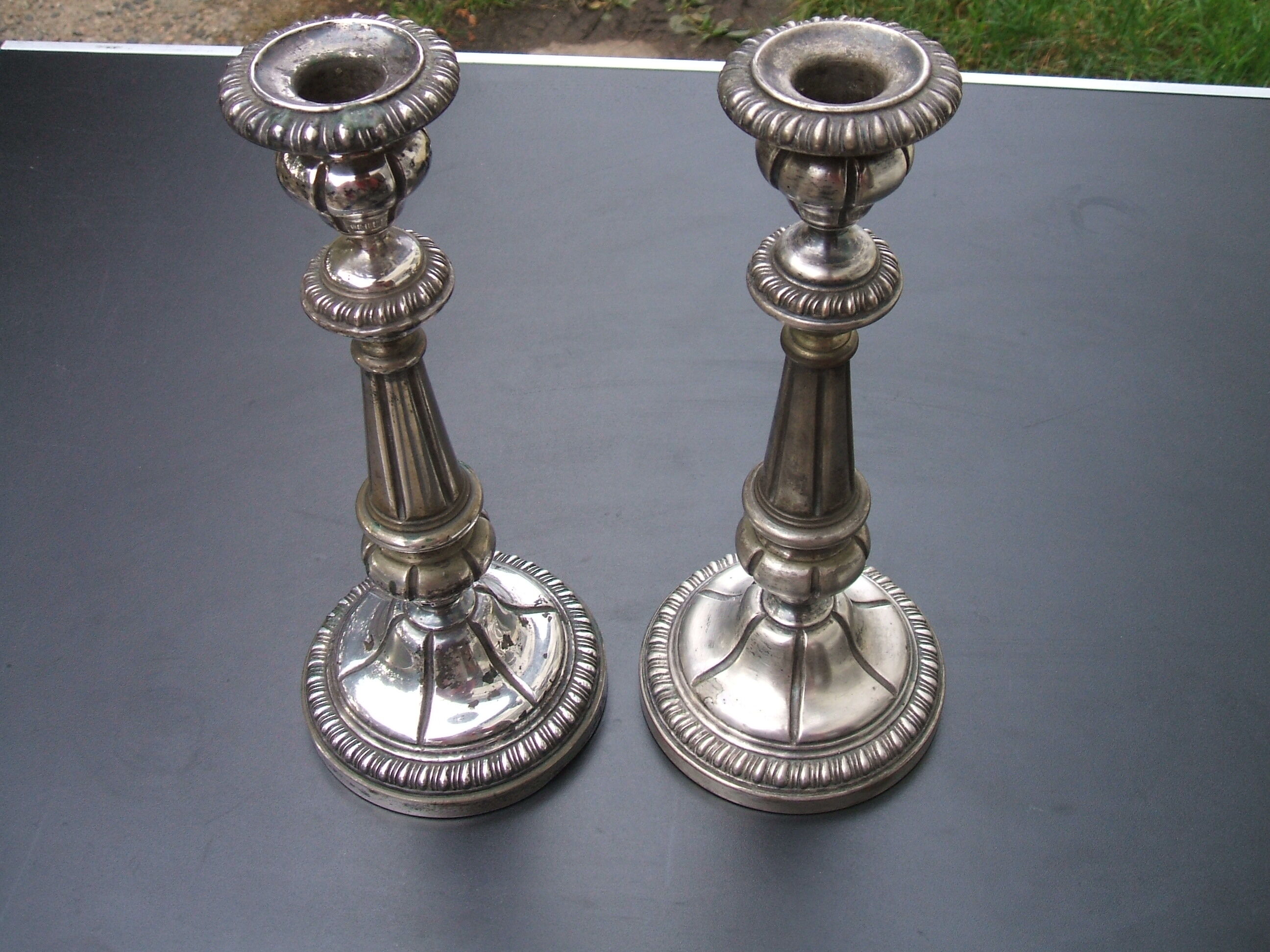 Pair of silver metal candle holders
